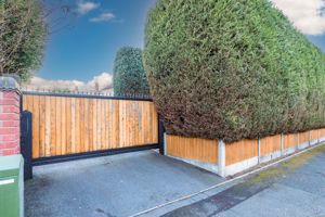 SECURE ELECTRIC GATED ENTRANCE TO DRIVEWAY- click for photo gallery
